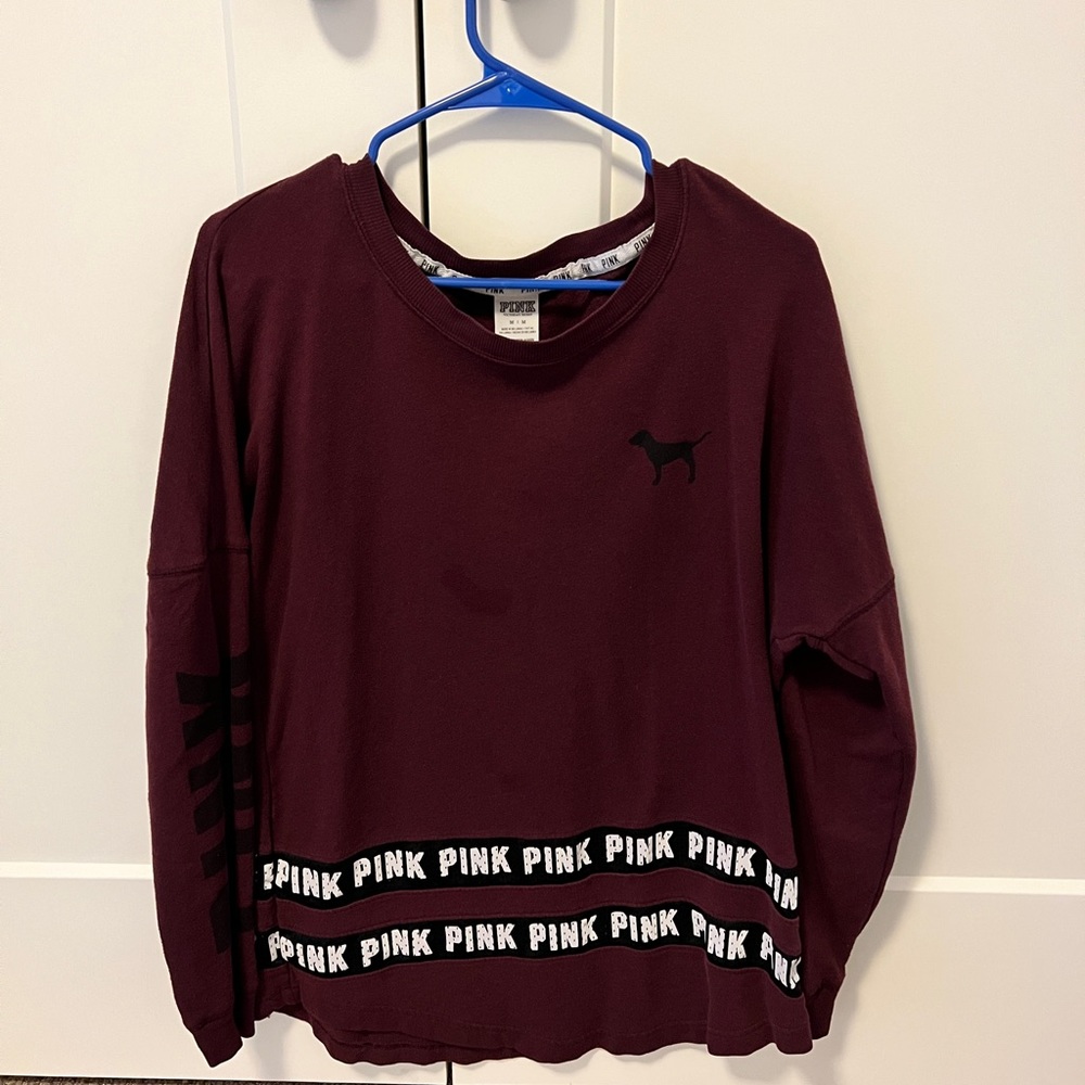 Gently worn athletic sweater